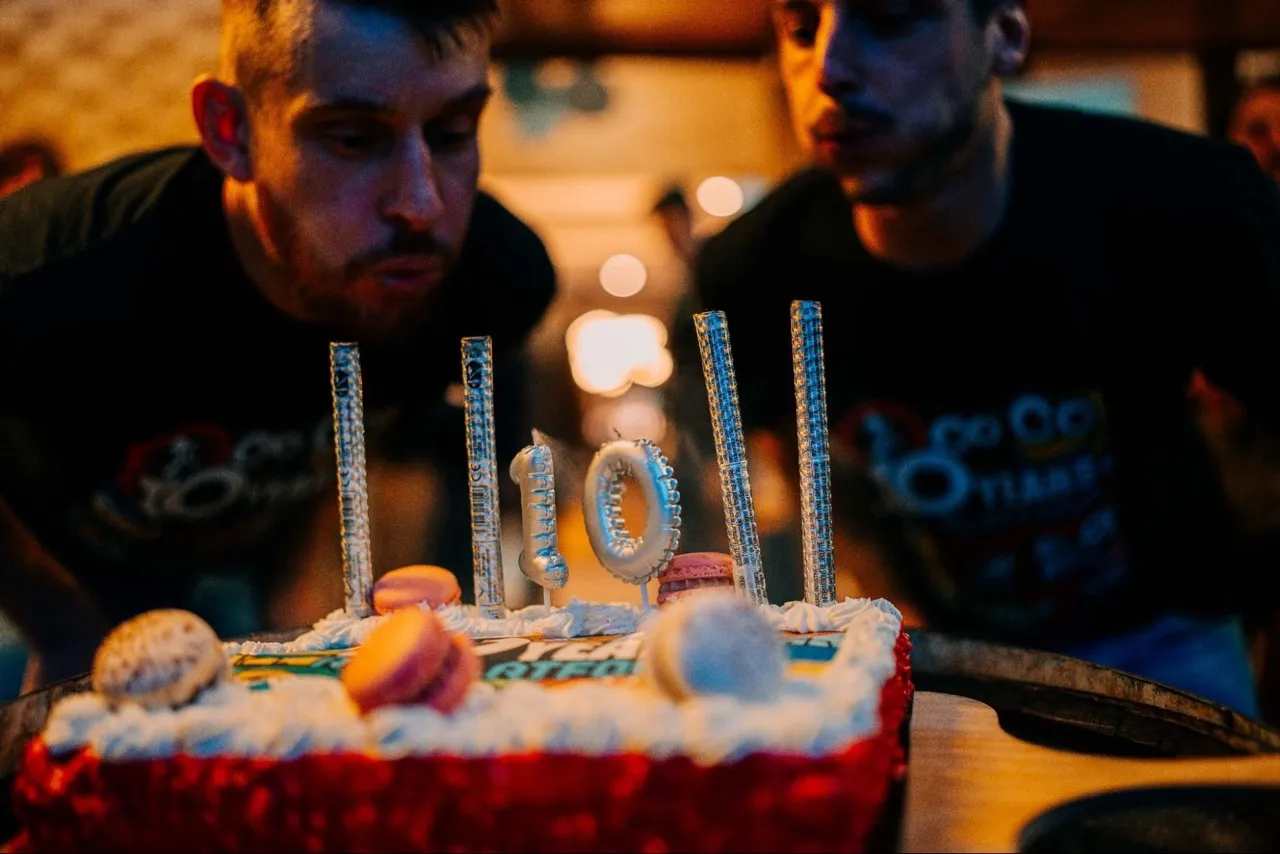 Kevin Dunglas and Antoine Bluchet blowing API Platform candles